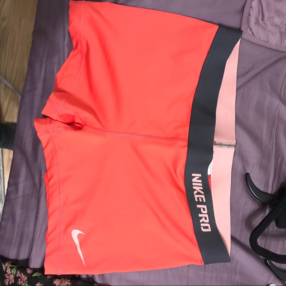 Bright peach Nike pro shorts